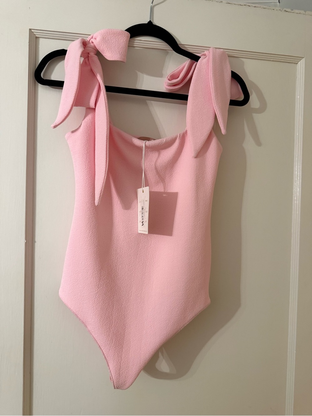 Show Me Your Mumu NWT light pink body suit